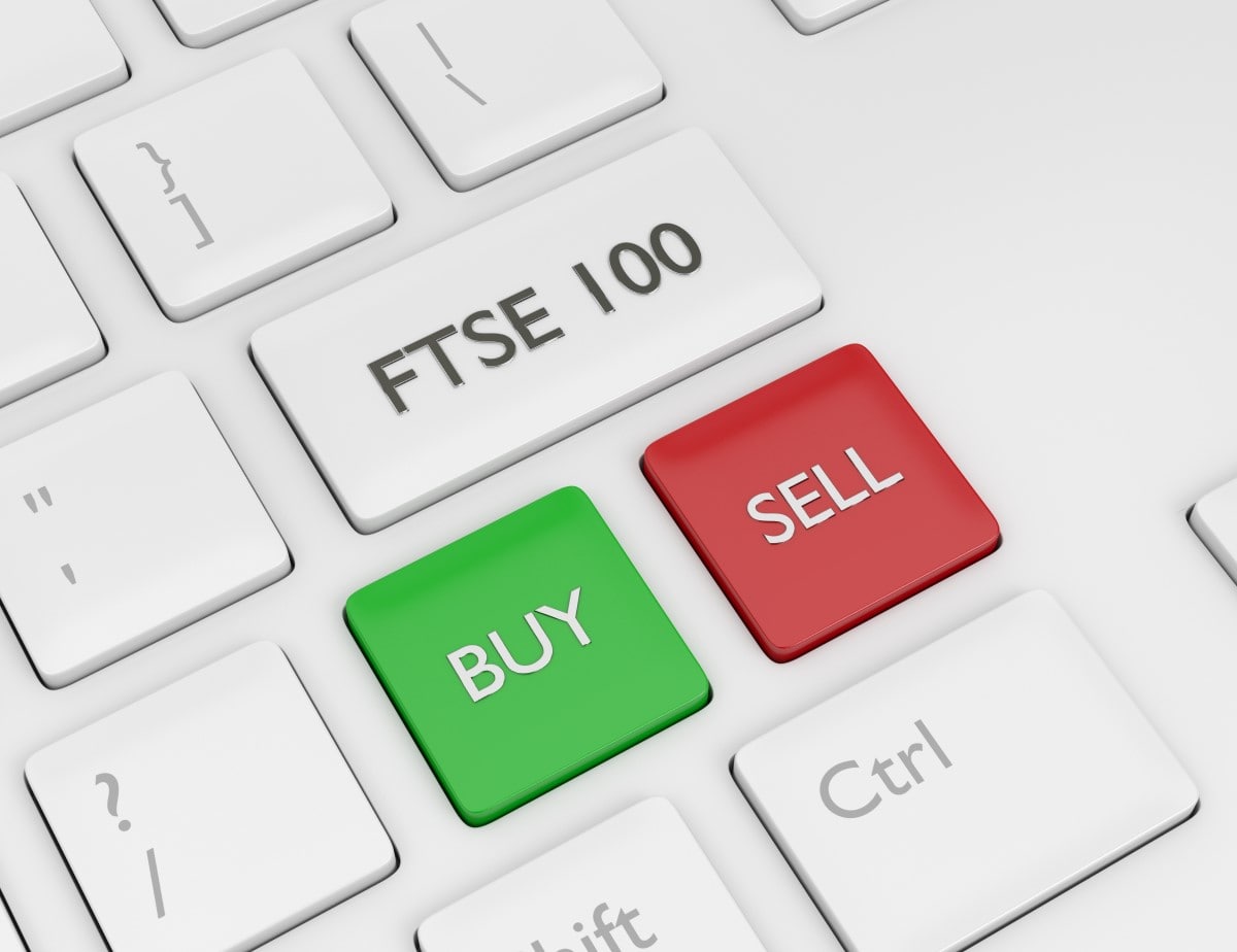 Keyboard buttons "FTSE 100", "BUY", "SELL"